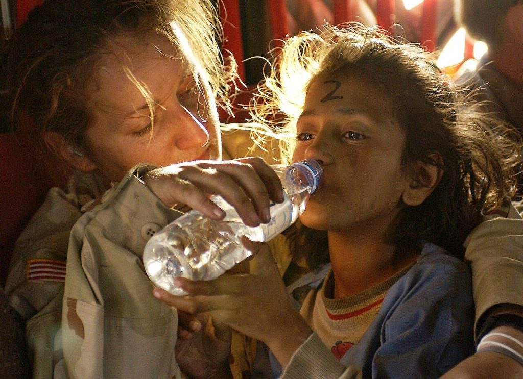 Humanitarian aid reaching a child in need