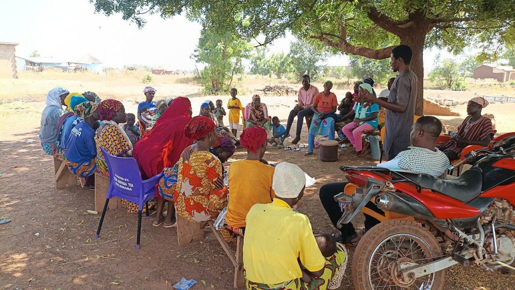 Village community development meeting in northern Ghana