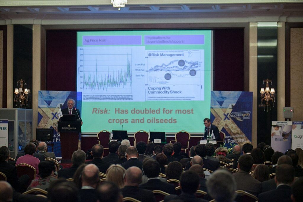 Conference audience watching a data presentation